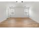 Bright bedroom featuring neutral walls and natural light from the windows at 6122 Lowder Rd, Salisbury, NC 28147