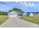 Inviting single-Gathering home with a paved driveway leading to an attached garage; new construction at 6122 Lowder Rd, Salisbury, NC 28147