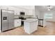 Modern kitchen featuring stainless steel appliances, granite countertops and a large island at 6122 Lowder Rd, Salisbury, NC 28147