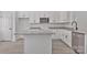 Kitchen boasts granite countertops, stainless steel appliances, a functional island, and ample cabinet space at 6122 Lowder Rd, Salisbury, NC 28147