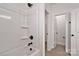 This bathroom features a white shower-tub combo with matte black fixtures at 6154 Lowder Rd, Salisbury, NC 28147