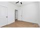 Neutral bedroom featuring new flooring, closet, and ceiling fan at 6154 Lowder Rd, Salisbury, NC 28147