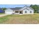 Charming single-story home featuring a landscaped front yard and attached garage, perfect for comfortable living at 6154 Lowder Rd, Salisbury, NC 28147