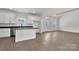 Well-lit kitchen featuring an island, modern appliances, and lots of cabinet space at 6154 Lowder Rd, Salisbury, NC 28147