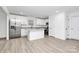 Open concept kitchen with island and stainless steel appliances at 6154 Lowder Rd, Salisbury, NC 28147