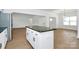 Stylish kitchen island with granite countertops and modern fixtures, open to the living area at 6154 Lowder Rd, Salisbury, NC 28147