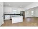 Modern kitchen featuring granite countertops, stainless steel appliances, and ample natural light at 6154 Lowder Rd, Salisbury, NC 28147