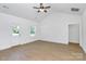 Spacious living room with a door to the outside and natural light from the window at 6154 Lowder Rd, Salisbury, NC 28147