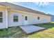 Concrete patio with convenient access to the home and a small square for dining or relaxation at 6154 Lowder Rd, Salisbury, NC 28147