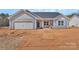 Charming single-story home with blue siding, garage, and covered front entry showcasing a modern, cozy design at 6160 Lowder Rd, Salisbury, NC 28147