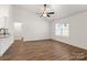Living room with wood flooring, vaulted ceilings, and abundant natural light at 6160 Lowder Rd, Salisbury, NC 28147