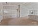 Spacious living room undergoing construction, showcasing the layout and potential of the space at 6160 Lowder Rd, Salisbury, NC 28147