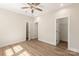 Inviting bedroom with vinyl floors, closet, and an open door that offers versatile usage at 320 Ferebee Pl # Brx0021, Charlotte, NC 28213