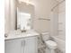 Bright bathroom featuring a shower-tub, patterned tile floors, and a modern vanity at 312 Ferebee Pl # Brx0023, Charlotte, NC 28213