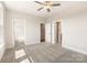 Spacious bedroom with gray carpet, white walls, and plenty of natural light at 312 Ferebee Pl # Brx0023, Charlotte, NC 28213