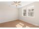 Bedroom with wood-style floors, neutral walls and two large windows at 312 Ferebee Pl # Brx0023, Charlotte, NC 28213