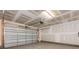 Spacious two-car garage with ample room for parking and storage with unfinished walls at 312 Ferebee Pl # Brx0023, Charlotte, NC 28213