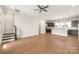 Spacious living area features wood floors, recessed lighting, and an open layout for seamless entertaining at 312 Ferebee Pl # Brx0023, Charlotte, NC 28213