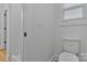 Bathroom featuring an efficient toilet, tile floor, plus a convenient shower at 6133 Long Branch Rd, Salisbury, NC 28147