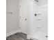 Bathroom showing a white shower with built-in shelving and modern fixtures at 6133 Long Branch Rd, Salisbury, NC 28147