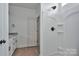 Bathroom with granite countertop, modern fixtures, and shower with large shower head at 6133 Long Branch Rd, Salisbury, NC 28147