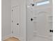 Modern bathroom featuring a bright white shower with black hardware and tile floor at 6133 Long Branch Rd, Salisbury, NC 28147