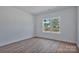Bedroom featuring a large window for natural light at 6133 Long Branch Rd, Salisbury, NC 28147