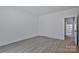 Spacious bedroom with door at 6133 Long Branch Rd, Salisbury, NC 28147