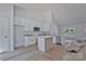 This kitchen features white cabinets, stainless steel appliances, and granite countertops at 6133 Long Branch Rd, Salisbury, NC 28147