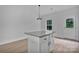 Well-appointed kitchen island featuring a granite countertop and ample storage space at 6133 Long Branch Rd, Salisbury, NC 28147