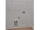 A utility room with washer and dryer hookups and wire shelving at 6133 Long Branch Rd, Salisbury, NC 28147