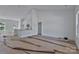 Bright living space features a high ceiling and view into the kitchen at 6133 Long Branch Rd, Salisbury, NC 28147