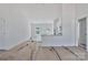 Bright living room featuring neutral walls, recessed lighting, with view into kitchen at 6133 Long Branch Rd, Salisbury, NC 28147