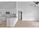 Open-concept living space with modern kitchen, granite countertops, and stainless appliances at 6133 Long Branch Rd, Salisbury, NC 28147