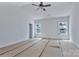 Spacious main bedroom with neutral walls, ceiling fan, and dual windows at 6133 Long Branch Rd, Salisbury, NC 28147