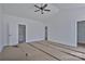 This main bedroom has vaulted ceilings and gray wood flooring at 6133 Long Branch Rd, Salisbury, NC 28147
