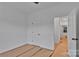 This bedroom features neutral walls and trim, bright natural light, and a closet at 6147 Long Branch Rd, Salisbury, NC 28147