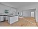 Bright kitchen with stainless steel appliances and a center island with stone countertops at 6147 Long Branch Rd, Salisbury, NC 28147