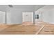 Spacious living room with white walls and large openings for natural light at 6147 Long Branch Rd, Salisbury, NC 28147