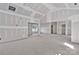 Bright living room features high ceilings, neutral walls, and ample natural light under construction at 6147 Long Branch Rd, Salisbury, NC 28147
