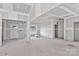Unfinished open living area with concrete floors and drywall walls, ready for customization at 6147 Long Branch Rd, Salisbury, NC 28147