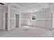 Bright and spacious room offers a minimalist design with high ceilings, and a window view, under construction at 6147 Long Branch Rd, Salisbury, NC 28147