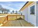 Spacious wood deck with railing and a clear blue sky at 6155 Long Branch Rd, Salisbury, NC 28147