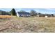 Spacious backyard featuring a wooden deck, set against a backdrop of a rural neighborhood at 6155 Long Branch Rd, Salisbury, NC 28147