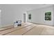 Bright, white interior featuring a bedroom with large window that offers natural light at 6155 Long Branch Rd, Salisbury, NC 28147