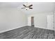 Large bedroom with vaulted ceiling, a ceiling fan, and gray vinyl flooring at 6155 Long Branch Rd, Salisbury, NC 28147