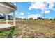 Expansive backyard, providing ample space for outdoor activities, bordered by other homes in the neighborhood at 11507 Valley Oaks Ln, Stanfield, NC 28163