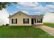 Ranch style home with a well-maintained lawn at 2327 Hope Valley Ln, Charlotte, NC 28213