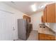 Small kitchen with stainless steel appliances and granite countertops at 2327 Hope Valley Ln, Charlotte, NC 28213