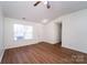 Spacious living room featuring hardwood floors and lots of natural light at 2327 Hope Valley Ln, Charlotte, NC 28213